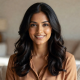 Portrait of Priya Patel, a woman with a friendly expression and dark hair